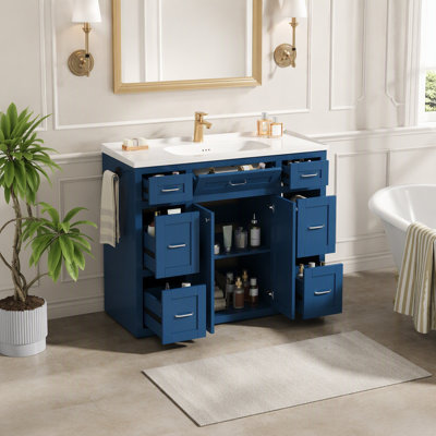 Meuble-lavabo de 122 cm avec lavabo en céramique – 6 tiroirs (3 de chaque côté), tiroir central à ouverture latérale, portes doubles à fermeture amortie, porte-serviettes latéral réversible, poignées argentées, MDF