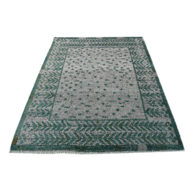 Iniguez Green Rug