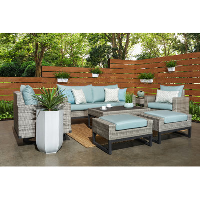 Ensemble de conversation en rotin avec coussins Sunbrella