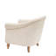 Fauteuil capitonné