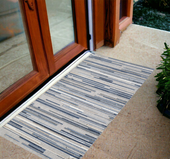 Tapis d'extérieur à rayures abstraites Gemmill, Bleu, Rectangulaire 2 pi x 4 pi
