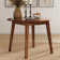 Tanan Extendable Oval Solid Wood Base Dining Table