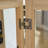 Lighted Glass Curio Display Cabinet with Drawer and Adjustable Shelves-447320500