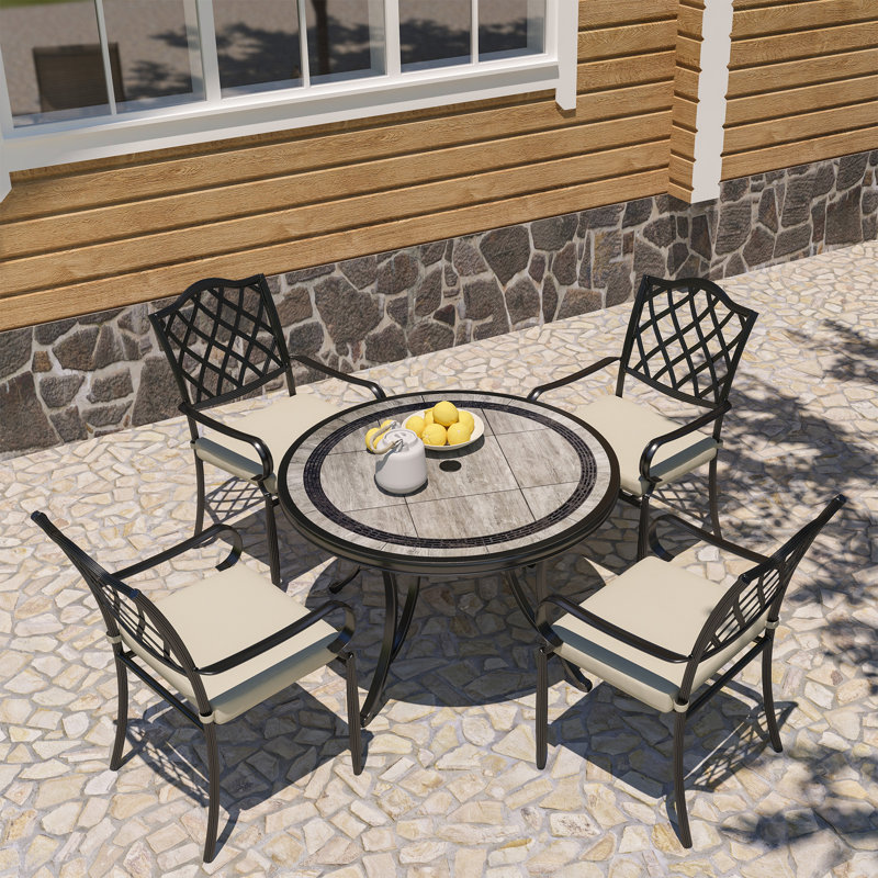 4 - Person Patio Dining Set with Round Table , Cushions Included