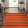 Bernick Tibetan Wool Pile Hand Knotted Striped Rug in Rust