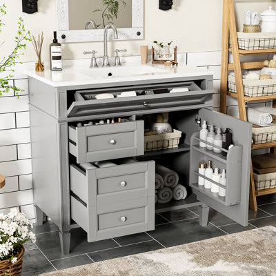 Armoire de salle de bain avec lavabo en céramique et espace de rangement fonctionnel