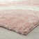 Tapis rose à motif géométrique Koo
