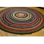 Tapis rond tressé antique à motif circulaire
