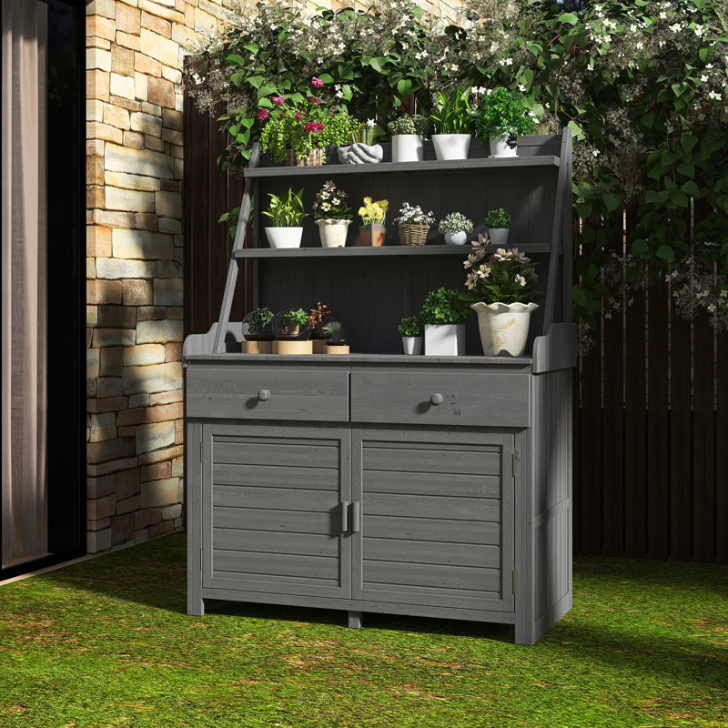 Table de rempotage avec tablette de rangement, tiroir et armoire