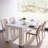 This White Marble Grain MDF Dining Table With Grooved Legs Seats Six To Eight People For Dining Room And Living Room Use