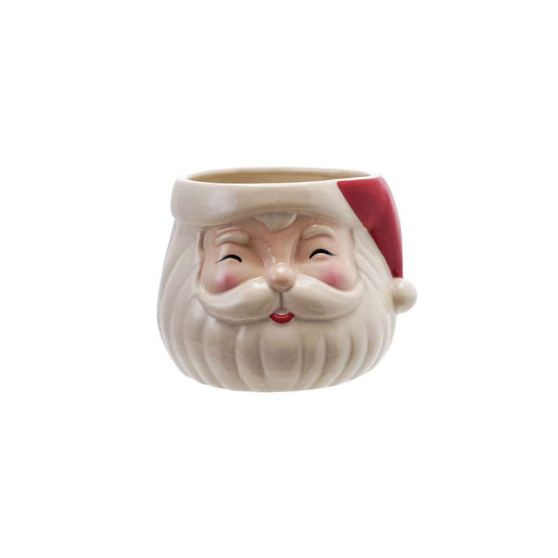 Pot de fleurs en forme de père Noël en grès