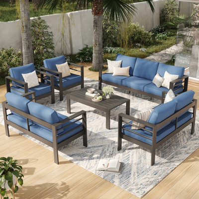 Tashiya 9 - Person Outdoor Seating Group with Cushions by Latitude Run