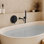 Robinet de baignoire mural avec valve à pression équilibrée et douche à main