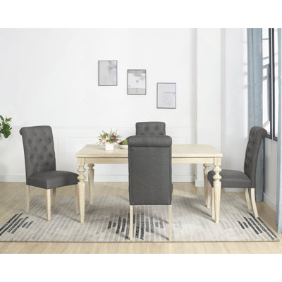 Ensemble de salle à manger 5 pièces à pieds tournés avec 4 chaises capitonnées Amonia