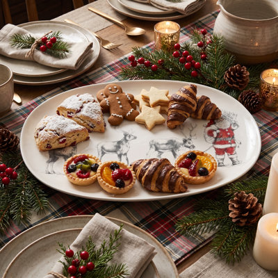Oval Stoneware Serving Platter with Santa Leading Reindeer Image