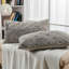 Housse de coussin jacquard en fausse fourrure-167898206-167898203