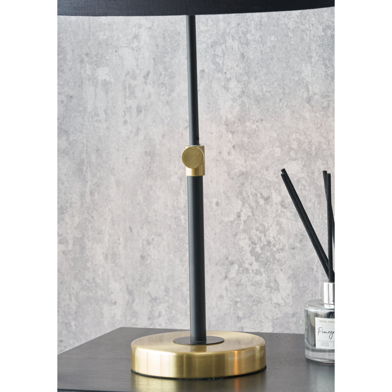 Bryce Black and Gold Metal Rise and Fall Table Lamp