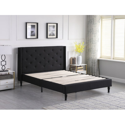 Upholstered Wingback Bed