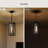 Shaw 17" 1-Light Antique Bronze Outdoor Pendant with Clear Water Glass-127392953