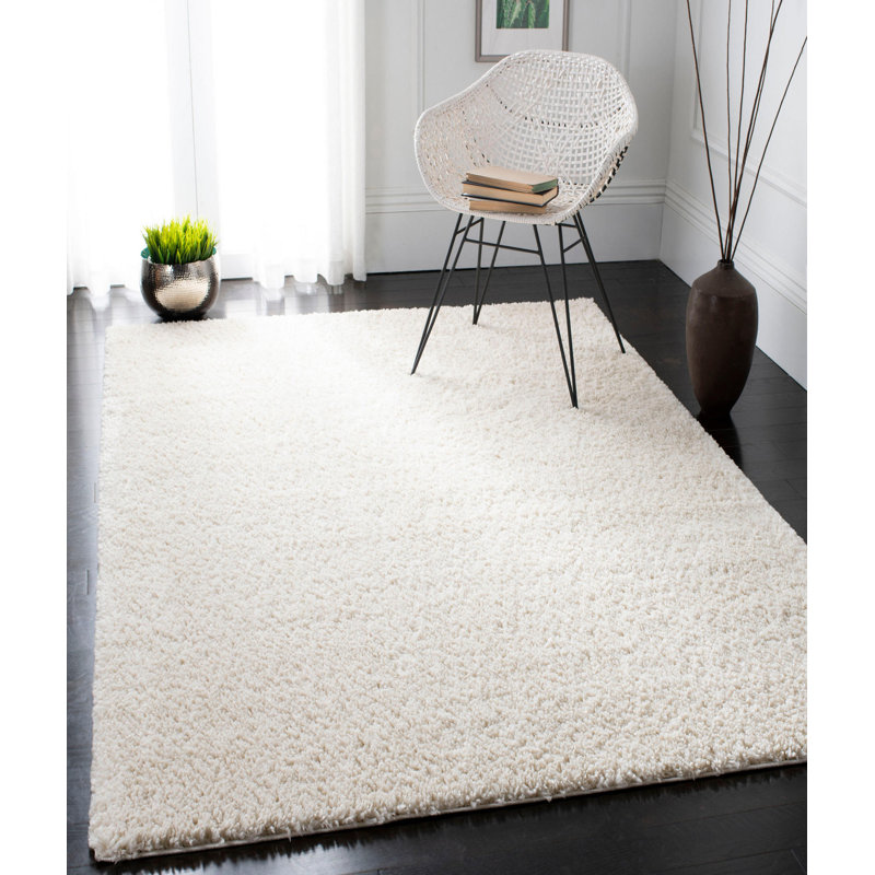 Tapis rectangulaire en polypropylène tissé à la machine de couleur unie crème, Rectangle 6 pi 7 po x 9 pi 6 po