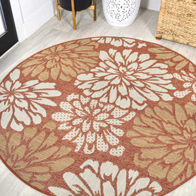 Tapis intérieur / extérieur à motif floral texturé orange / crème Zinnia