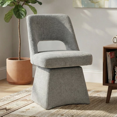 Chaise rembourrée pivotante