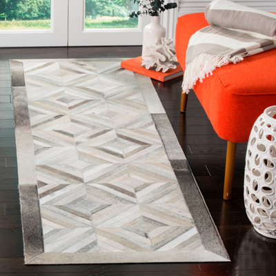 Cartwright Hand Woven Leather Geometric Area Rug