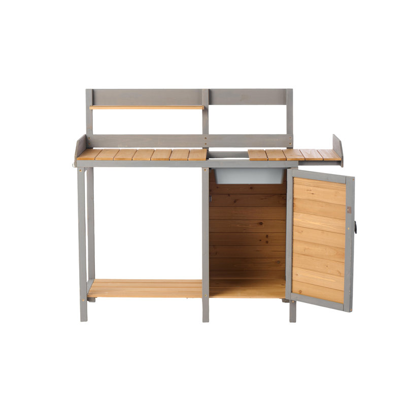Table de table d'extérieur en bois avec évier