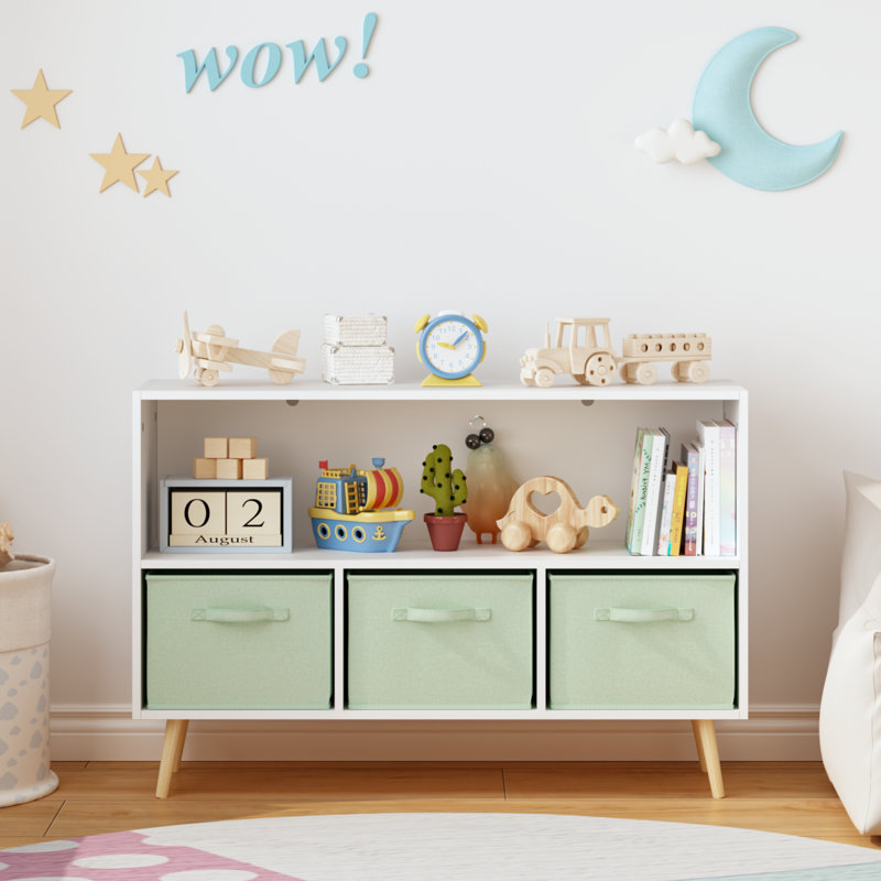 Bibliothèque blanche et verte avec tiroirs en tissu pliables pour enfants