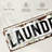 " Rusty Laundry Sign Canvas Print "-2028897308