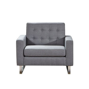 Fauteuil capitonné