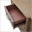 Commode compacte à devanture compacte avec tiroirs spacieux et placages en bois de mindi durables, parfaite pour les chambres à coucher modernes.