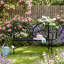 Banc de jardin en métal à dossier papillon avec tables d'appoint intégrées Whimsical - Banc d'extérieur pour 2 personnes-732584331