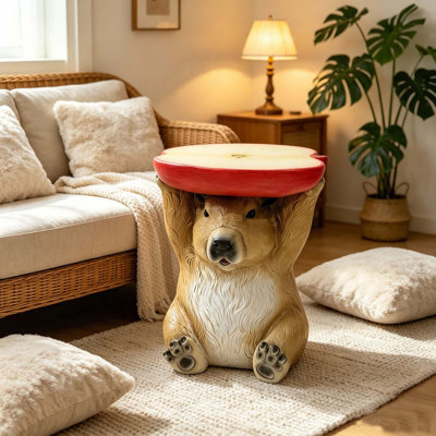 Tabouret décoratif original et mignon en forme de capybara tenant une tranche de pomme, idéal pour une table d'appoint, une terrasse, un jardin, un porche ou un salon.