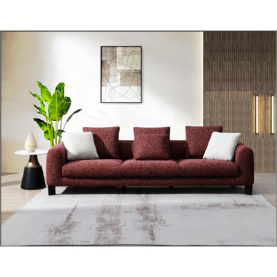 Luxurious Tweed Sofa With Three Pillows, Offering Comfortable Seating And Sturdy Construction For Your Living Space