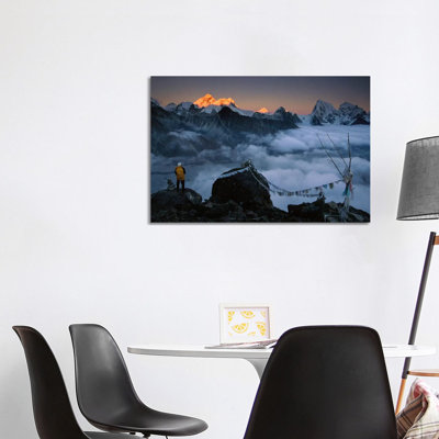 Mountaineer Enjoying The View Of Mt Everest And The Himalayan Mountains At Sunset From Gokyo Ri, Khumbu, Nepal by Colin Monteath - Wrapped Canvas Print