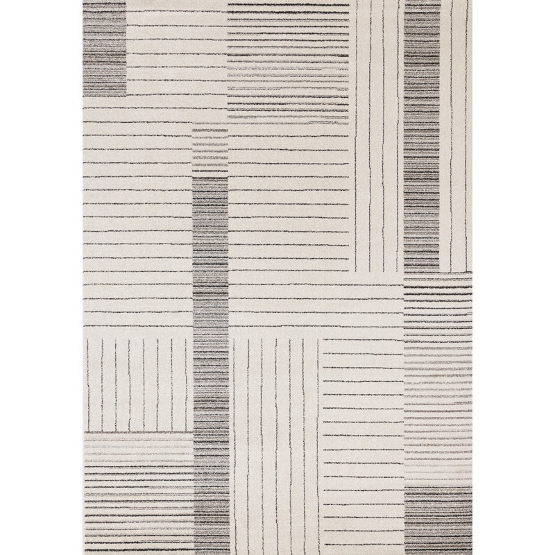 Tapis rayé noir et ivoire 8 pi x 11 pi