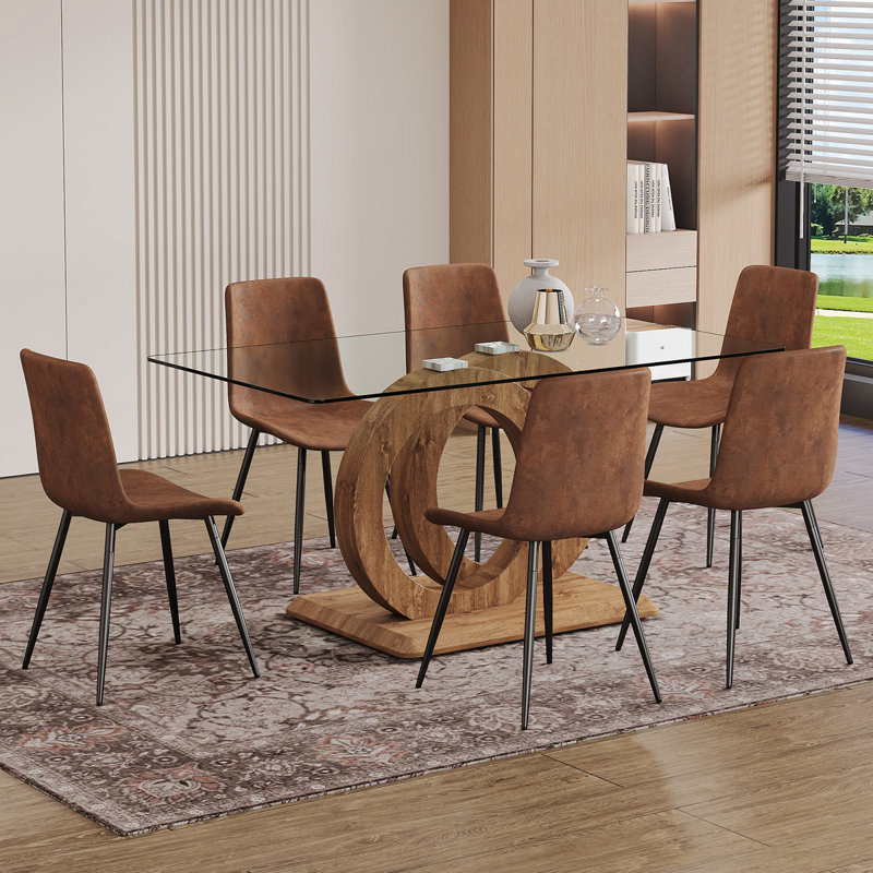 Ensemble de 1 table et 6 chaises. Plateau de salle à manger rectangulaire en verre trempé transparent de 63 po x 35,4 x 30 po avec support en bois aggloméré en bois aggloméré de couleur oc. Assorti de 6 chaises de salle à manger en tissu brun. W1151S02015