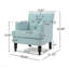 Fauteuil club capitonné
