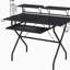 Bureau d'ordinateur noir avec plateau pour clavier