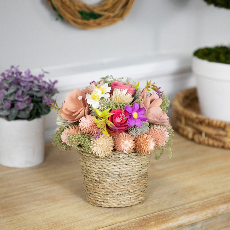 7" Multicolor Fabric and Wood Spring Floral Arrangement in Woven Pot