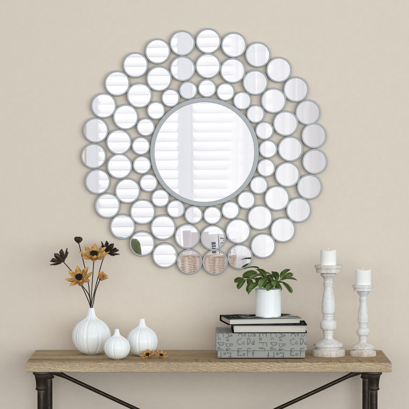 Miroir mural en métal argenté
