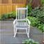 Chaise berçante en bois blanc, sans tapis