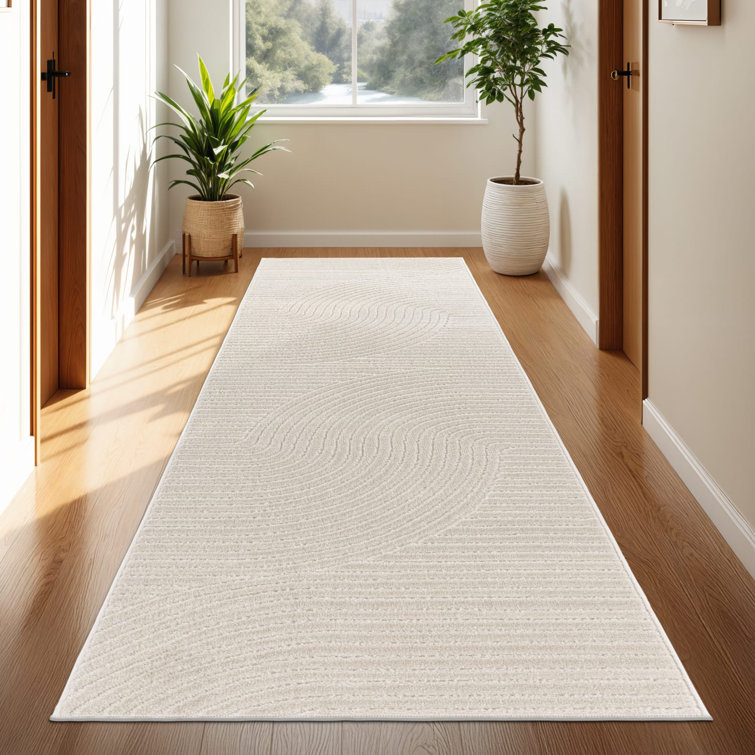Tapis moderne avec motif de lignes minimalistes crème