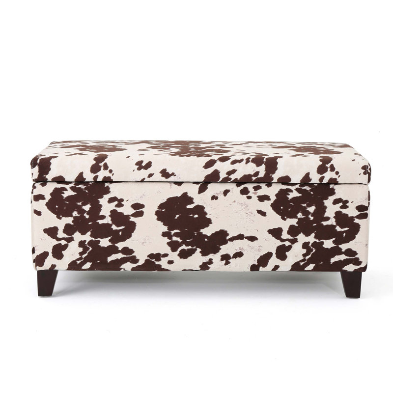 Repose-pieds de rangement polyvalent avec couvercle à fermeture en douceur, grand compartiment intérieur et revêtement en velours luxueux pour les espaces de vie modernes.