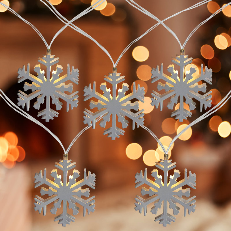 Battery Powered White Snowflake LED Christmas Lights with Clear Wire