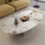 Table basse moderne en pierre frittée 49,2 po avec base en O en acier inoxydable - H 15,6 po