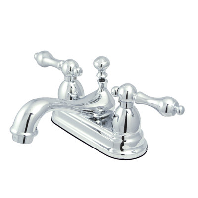 Kingston Brass Restoration Two-Handle 3-Hole Deck Mount 4" Centerset Bathroom Faucet with Brass Pop-Up