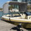 Housse pour bateau à 4 arceaux, rideaux amovibles en maille, auvent en polyester 600D de qualité marine avec cadre en aluminium de 1 po, comprend un coffre de rangement, 2 poteaux de soutien arrière et 2 sangles