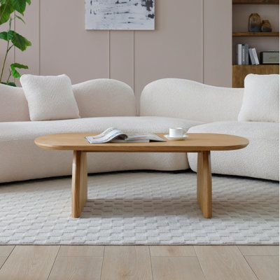 Table basse scandinave Elegance avec plateau elliptique et pieds en arc